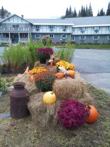 Carlson's lodge Fall decorations pumpkins hay bales and flowers