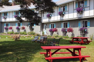 Front yard Carlson's Lodge Picnic bench lawn chairs relaxation