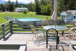 Deck and sitting area swimming pool family fun